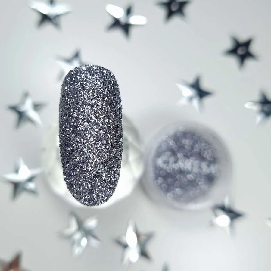 foto decoracion de uñas stardust dark silver claresa